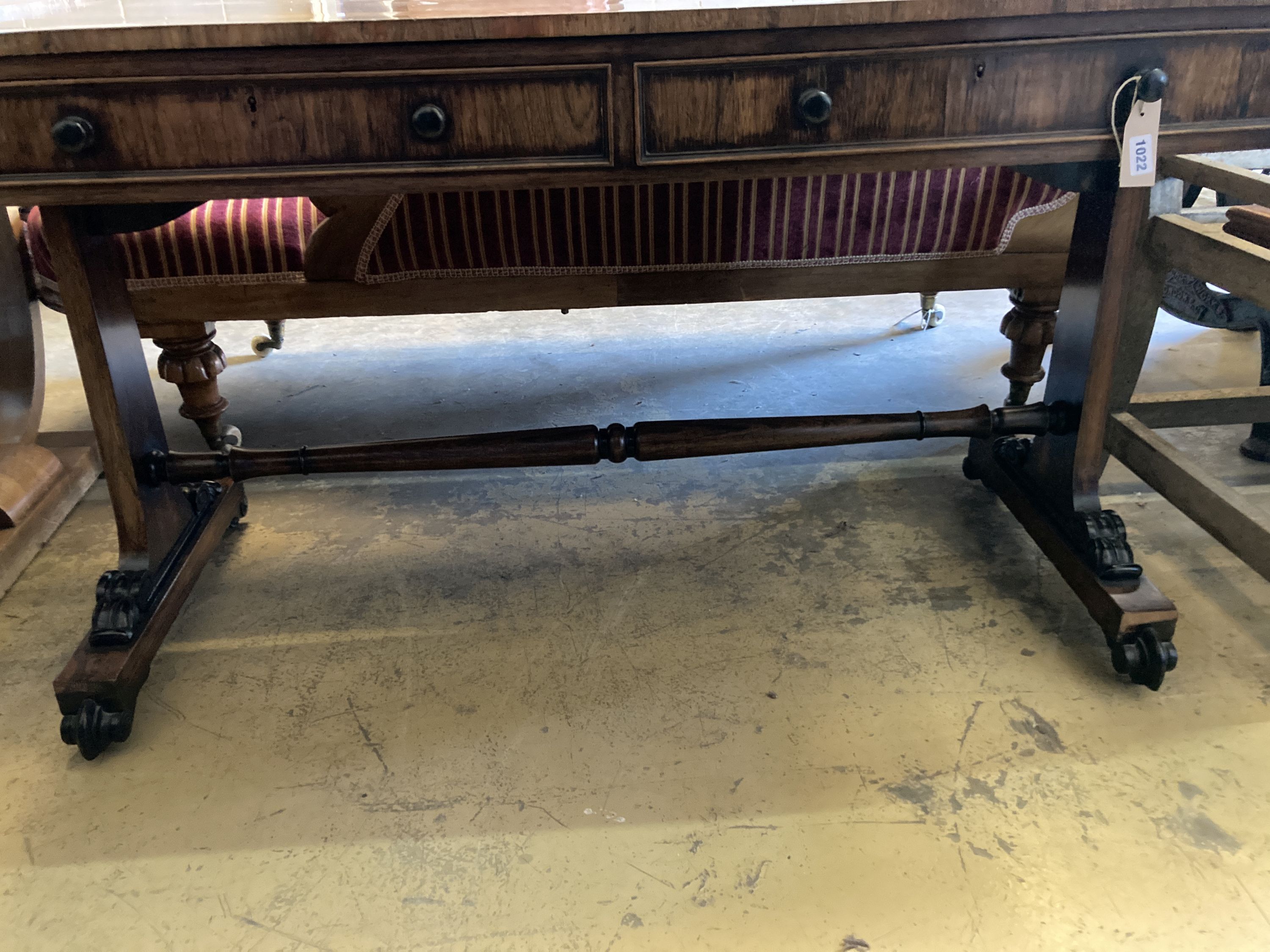 A Victorian rectangular rosewood two drawer library table, width 126cm, depth 66cm, height 76cm